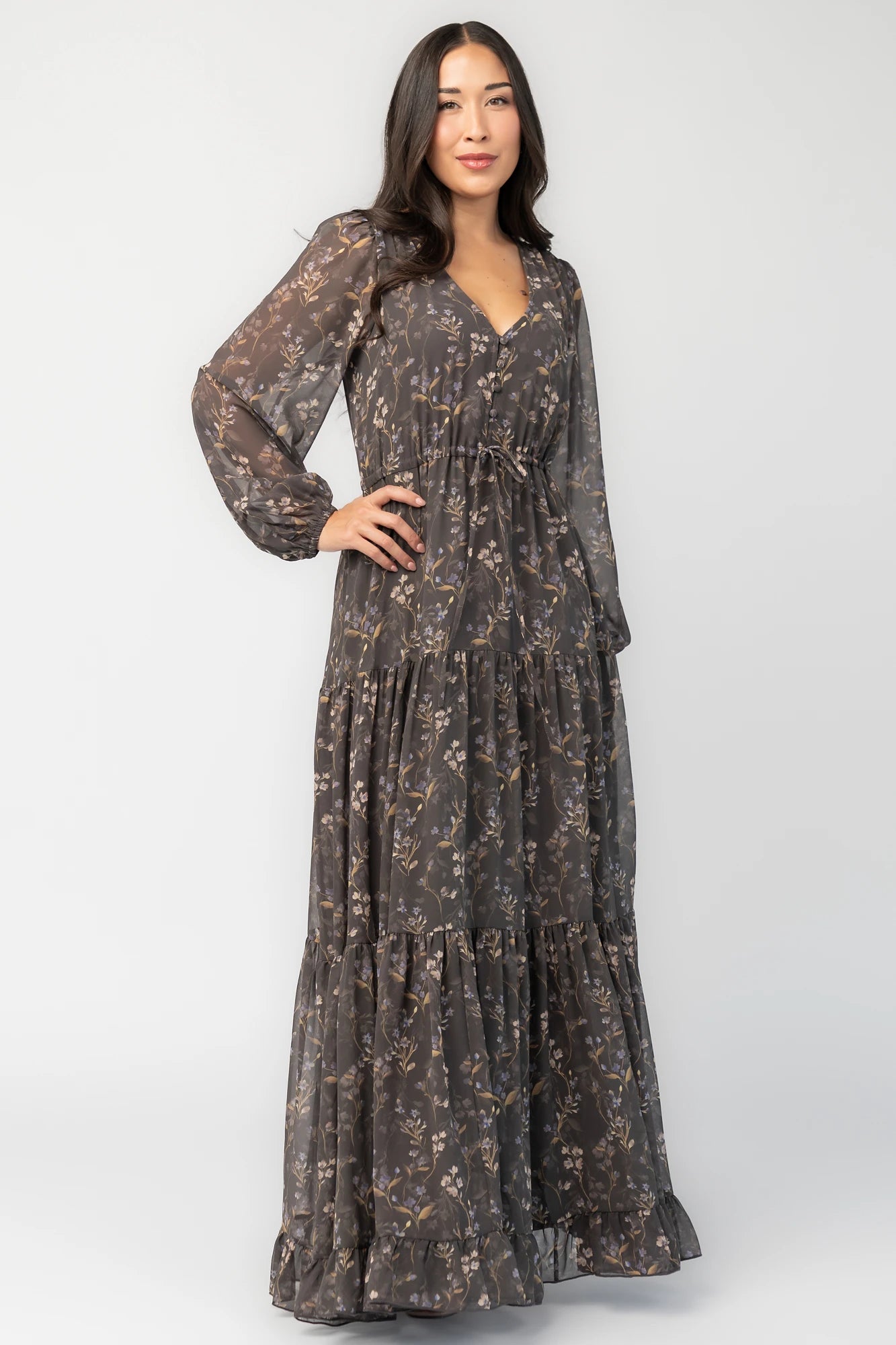 Hazel Boho Maxi Dress in Dusk Floral with V-neck, sheer long sleeves, drawstring waist, and tiered skirt.