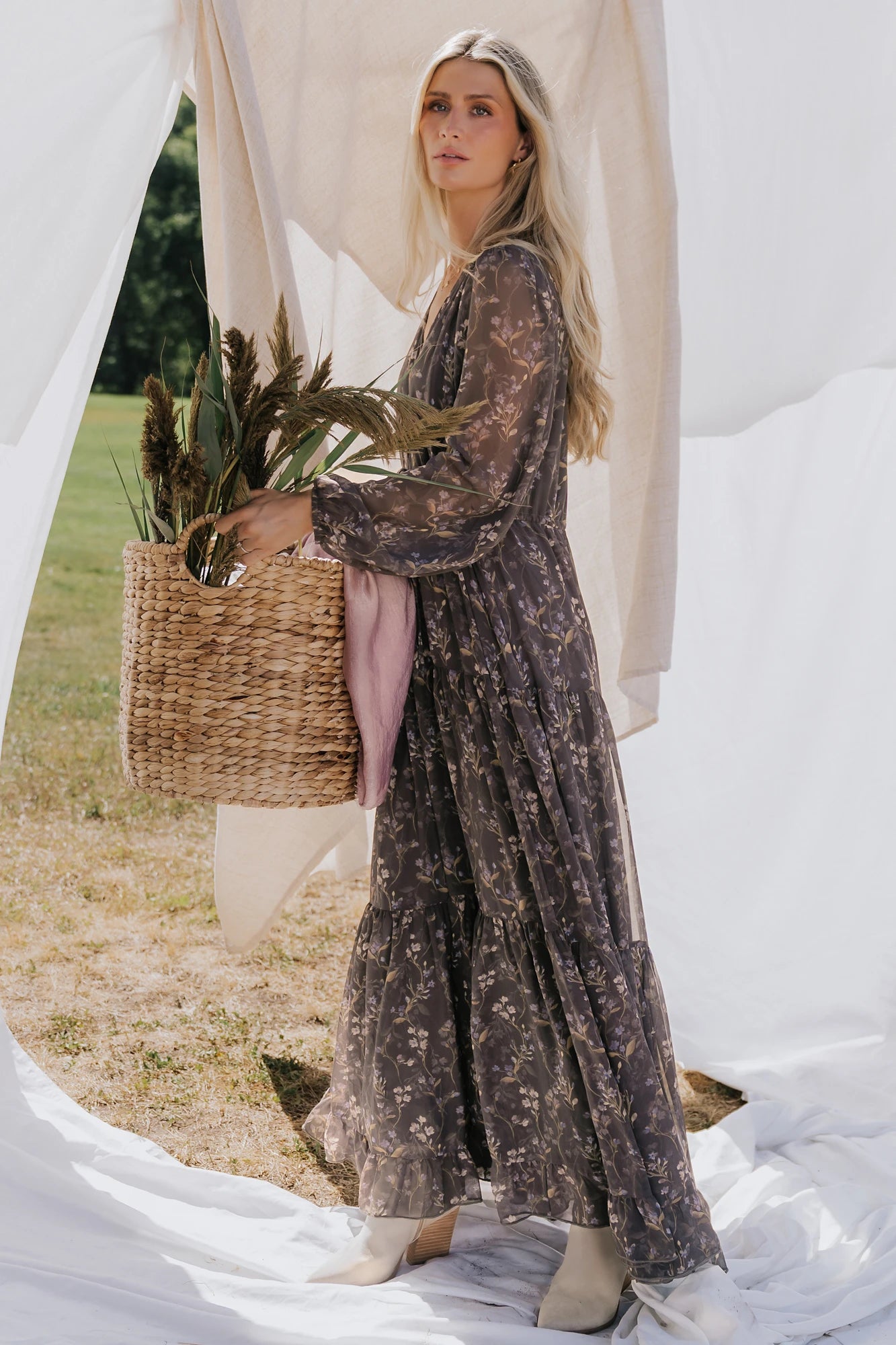 Hazel Boho Maxi Dress in Dusk Floral with V-neck, sheer long sleeves, drawstring waist, and tiered skirt.