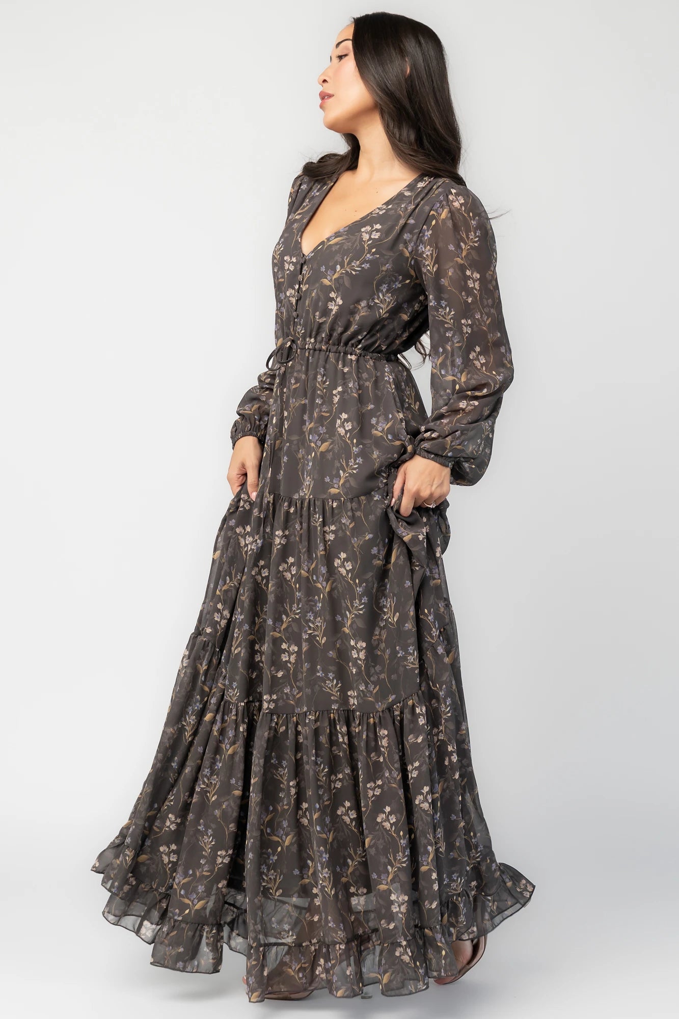 Hazel Boho Maxi Dress in Dusk Floral with V-neck, sheer long sleeves, drawstring waist, and tiered skirt.