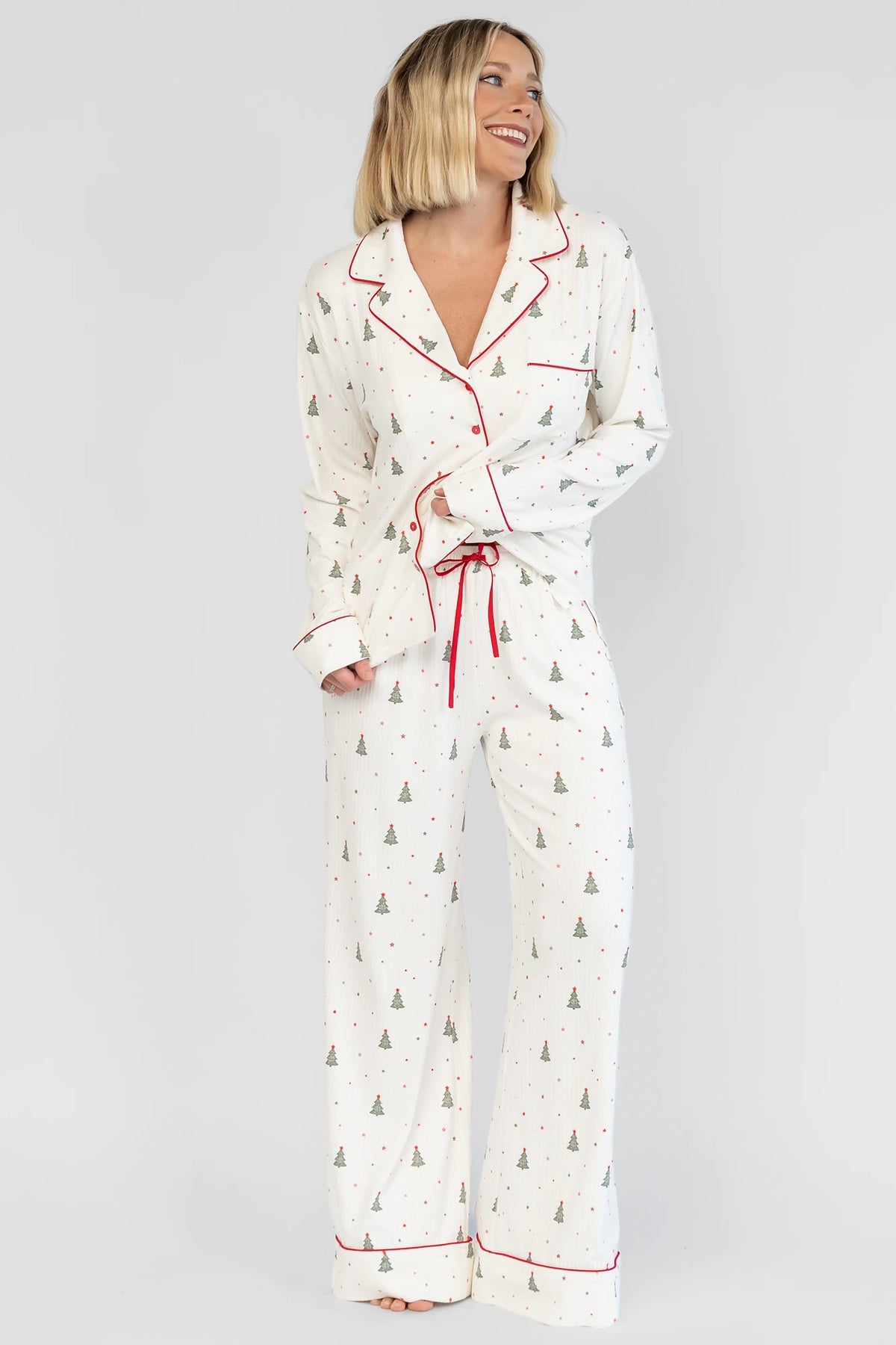 Holiday Cozy Rib Knit Pajamas in Ivory + Evergreen with an evergreen tree print, button-front top, and contrast red piping.