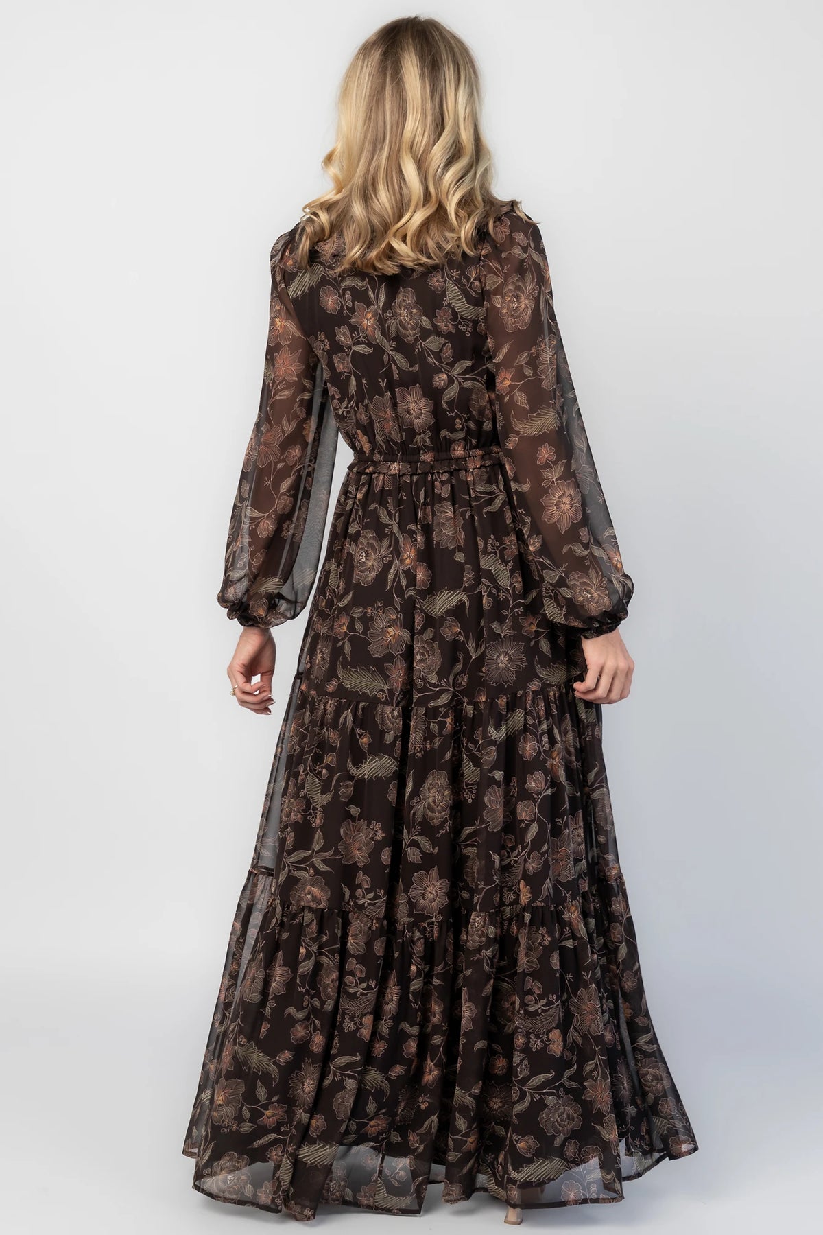 Jesslyn Maxi Dress in Brown Multi with V-neckline, ruffle trim, and button-down front.