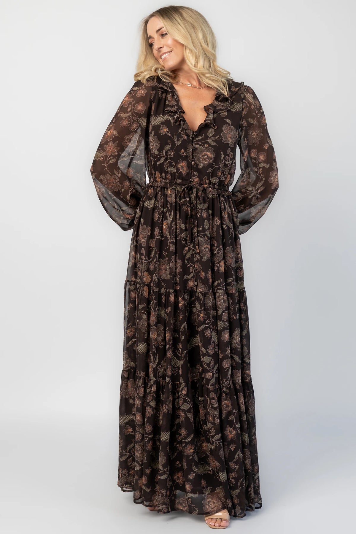 Jesslyn Maxi Dress in Brown Multi with V-neckline, ruffle trim, and button-down front.