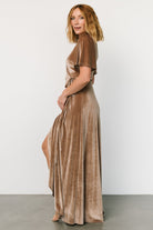 Close-up of taupe velvet fabric and V-neckline on the Katelyn Maxi Wrap Dress, showing texture and subtle stretch of material.