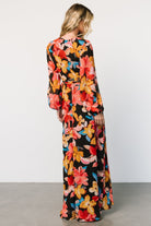 Back view of Katinka Wrap Maxi Dress in Tropical Night Floral highlighting full maxi length and chiffon movement.