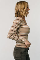 Close-up of Kaylee top fabric and neckline, showing tight-knit viscose blend, neutral stripe pattern, and rounded-square collar details.
