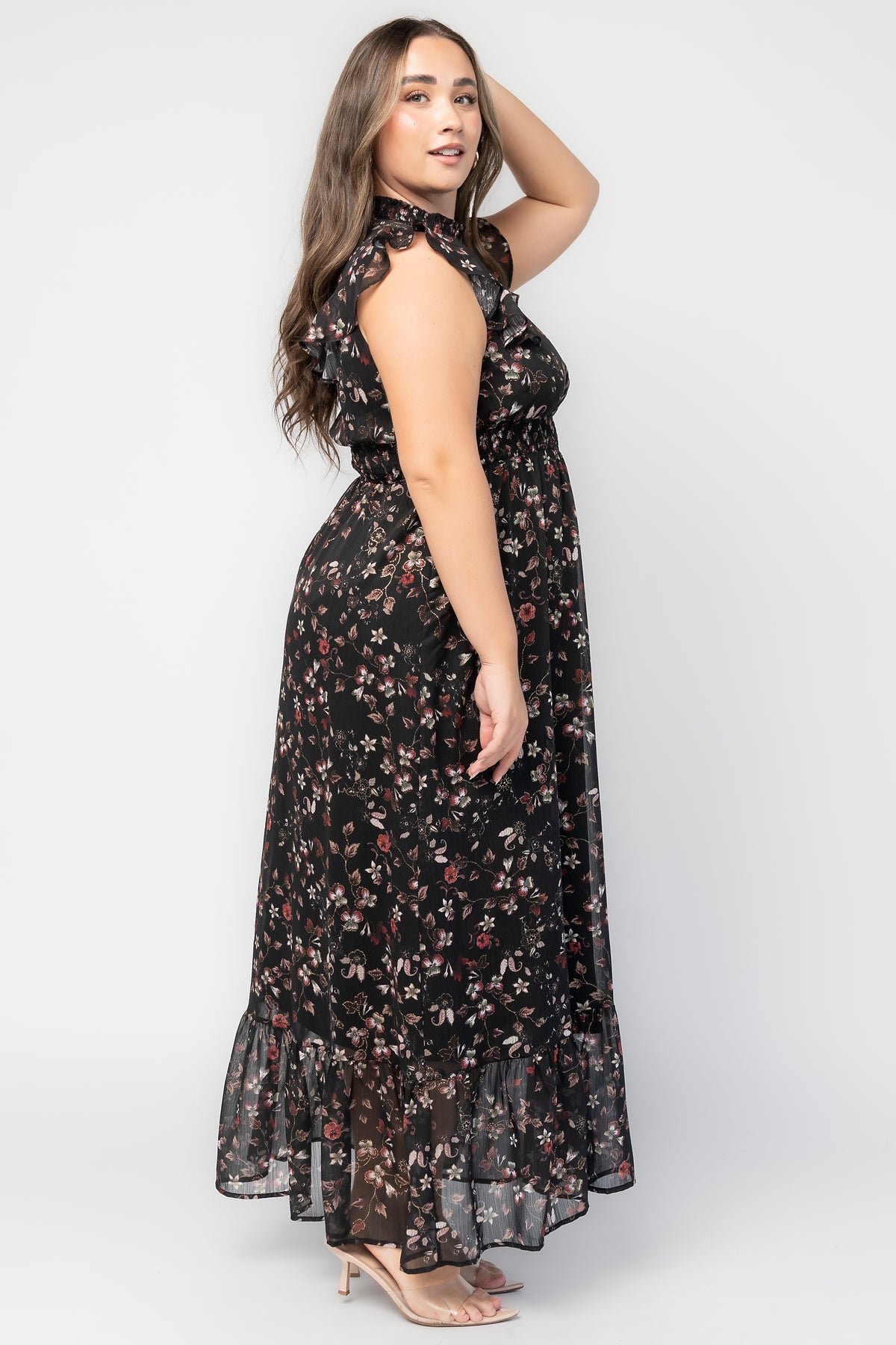 Kearny Ruffle Maxi Dress in Midnight + Gold Multi with gold florals, smocked high neckline, flutter sleeves, and ruffle hem.