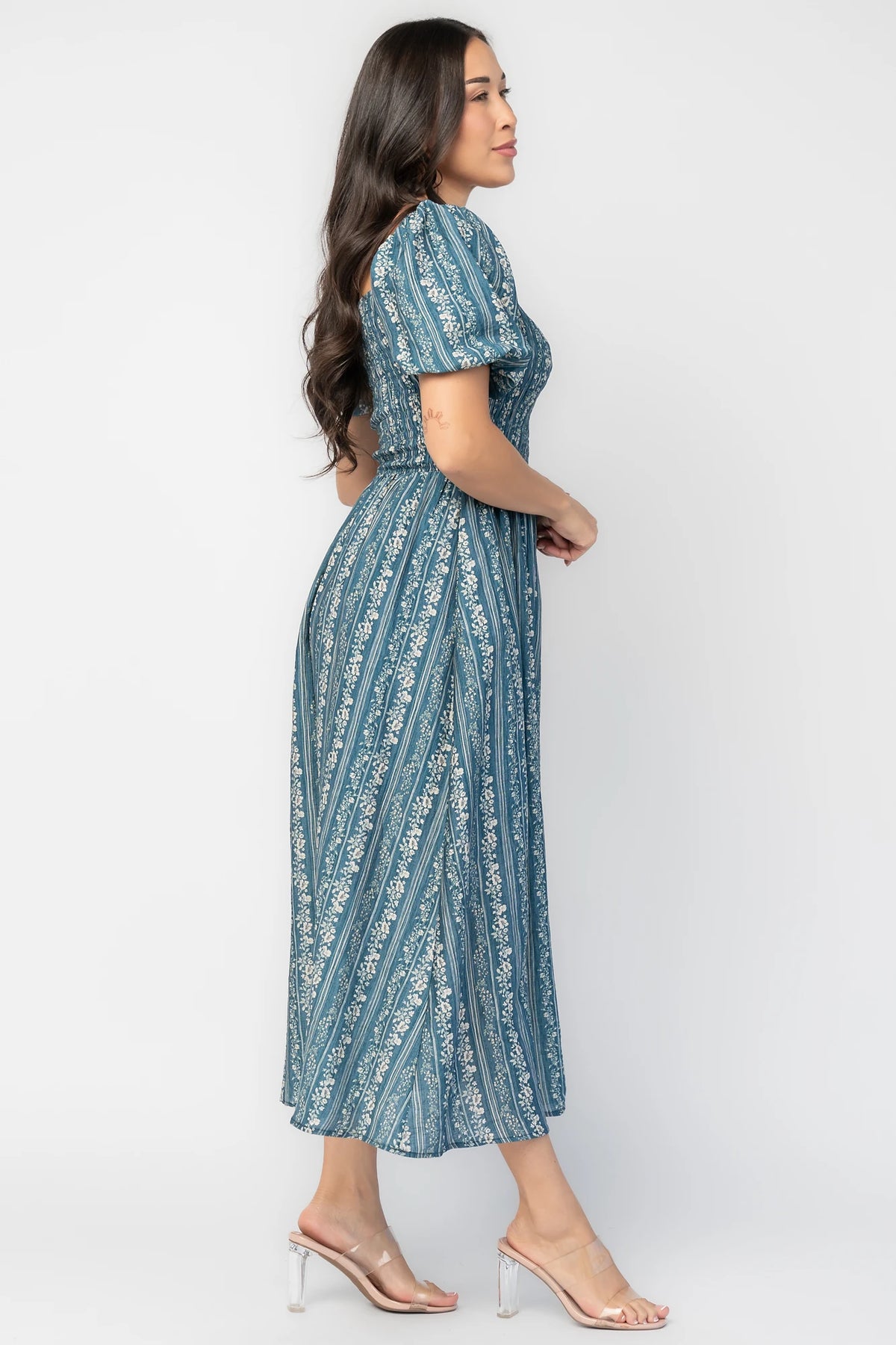 Keira Midi Dress in Blue Print with square neckline, smocked bodice, short puff sleeves, and midi skirt.
