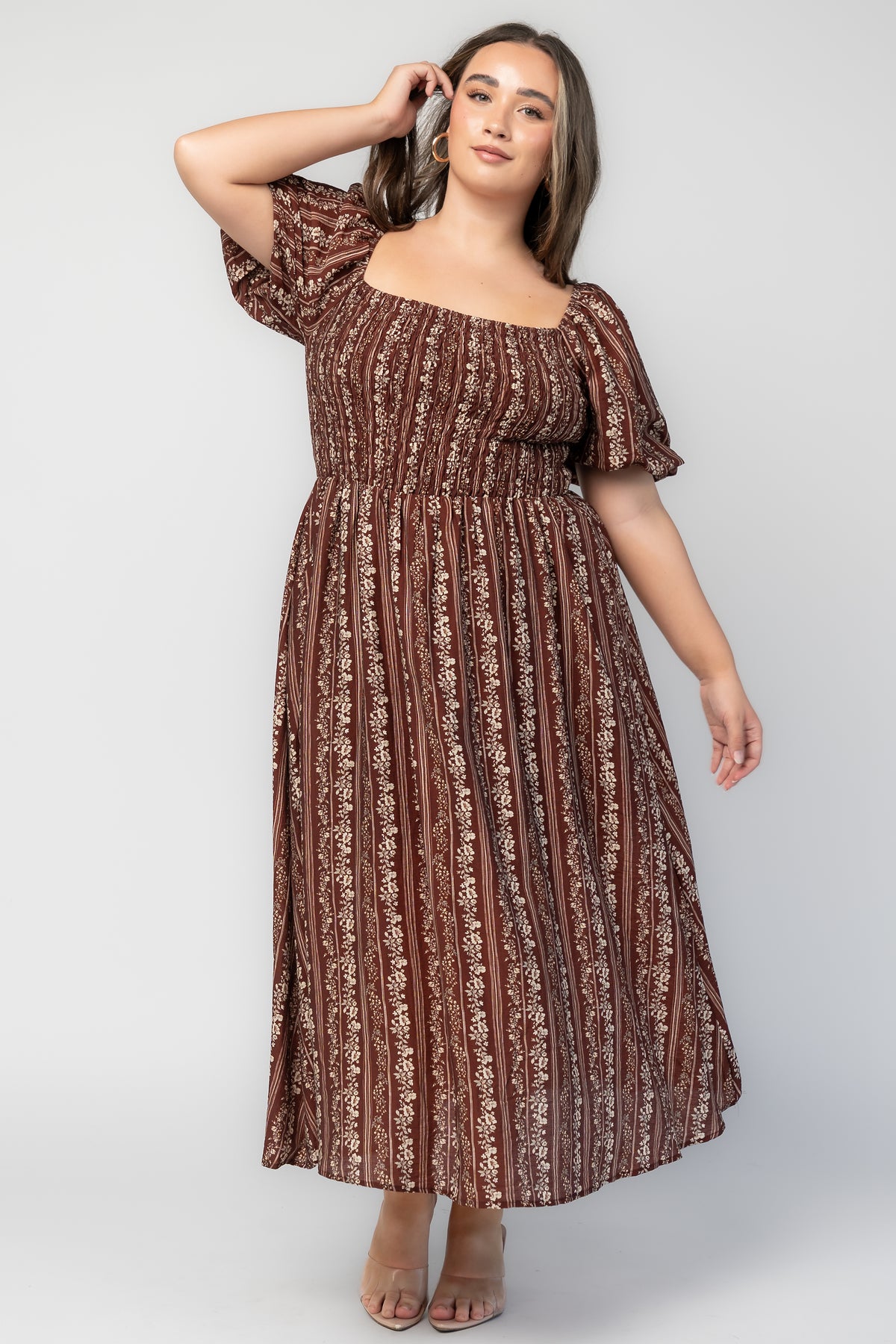 Keira Midi Dress in Mahogany Print with a square neckline, smocked bodice, and short puff sleeves.