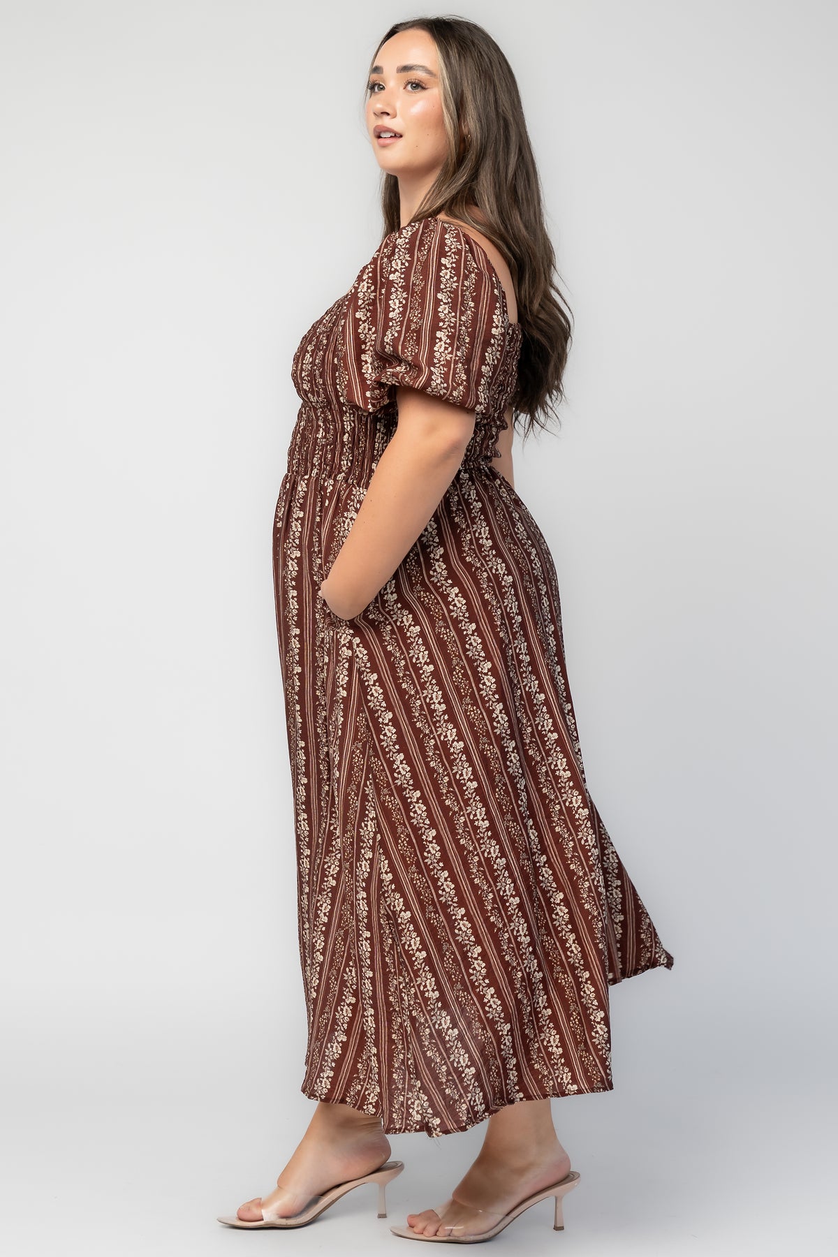 Keira Midi Dress in Mahogany Print with a square neckline, smocked bodice, and short puff sleeves.