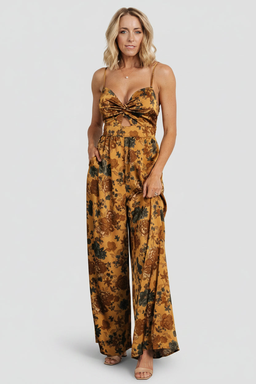 Back view of the Khloe jumpsuit showing the smocked back and how the palazzo legs drape for a relaxed yet refined silhouette.