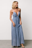 Detail shot of Korley Maxi Dress fabric in blue stripe demonstrating print scale, color and smooth woven polyester texture.