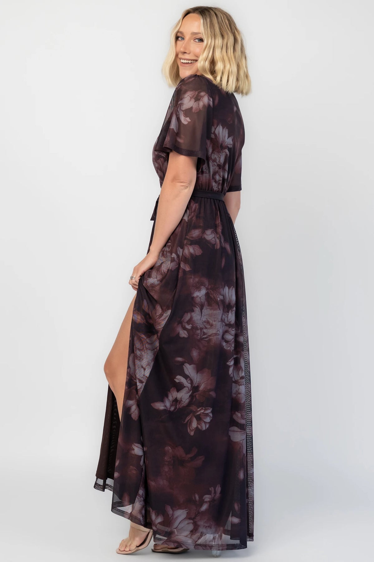 Kristina Mesh Maxi Dress in Dark Clove Floral with crossover neckline, elastic waist, and side slit.