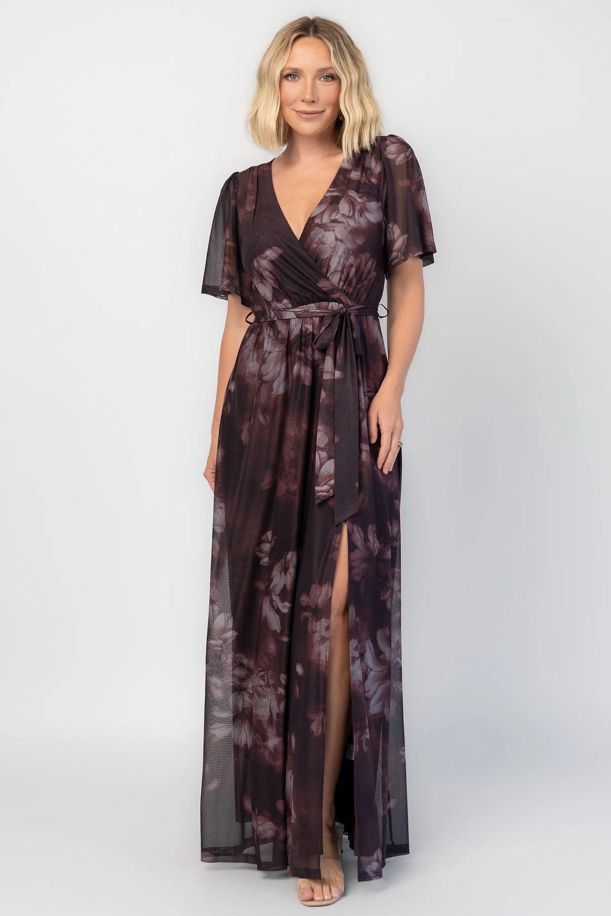 Kristina Mesh Maxi Dress in Dark Clove Floral with crossover neckline, elastic waist, and side slit.