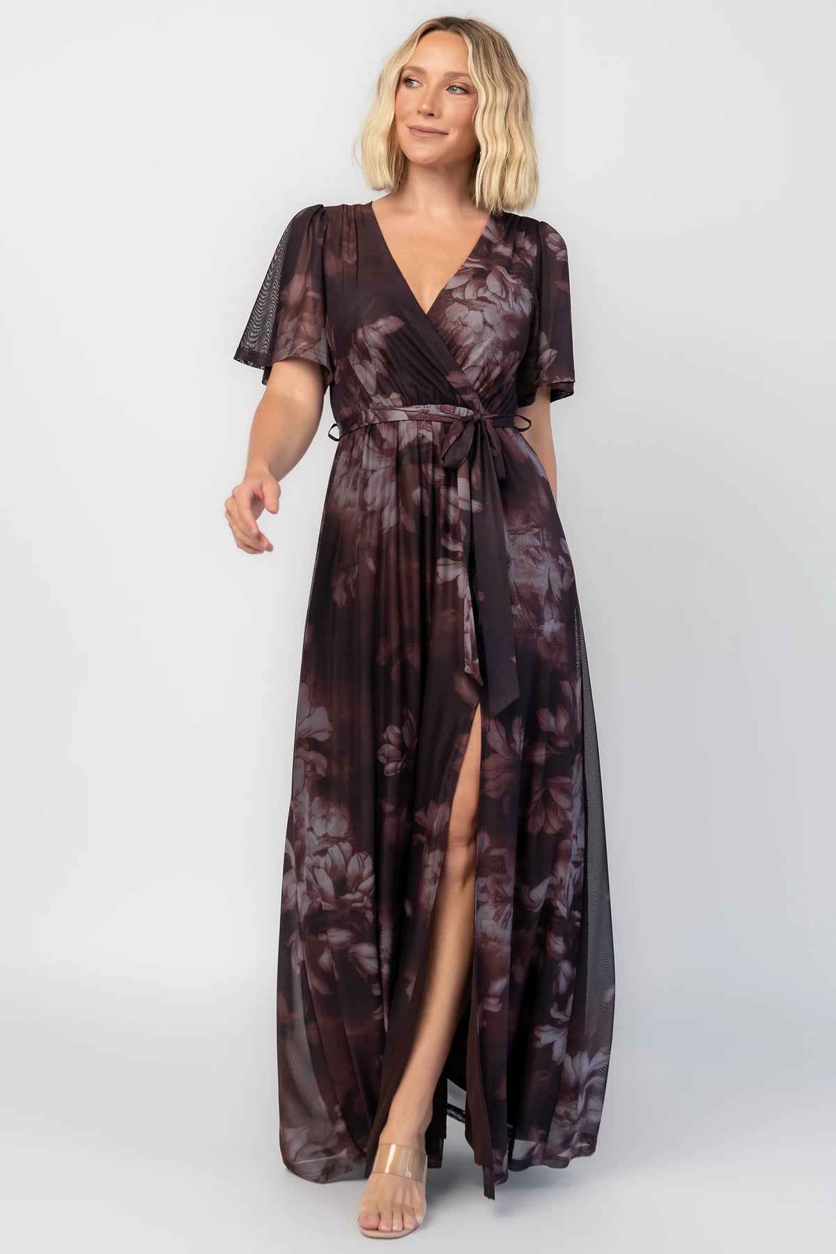 Kristina Mesh Maxi Dress in Dark Clove Floral with crossover neckline, elastic waist, and side slit.