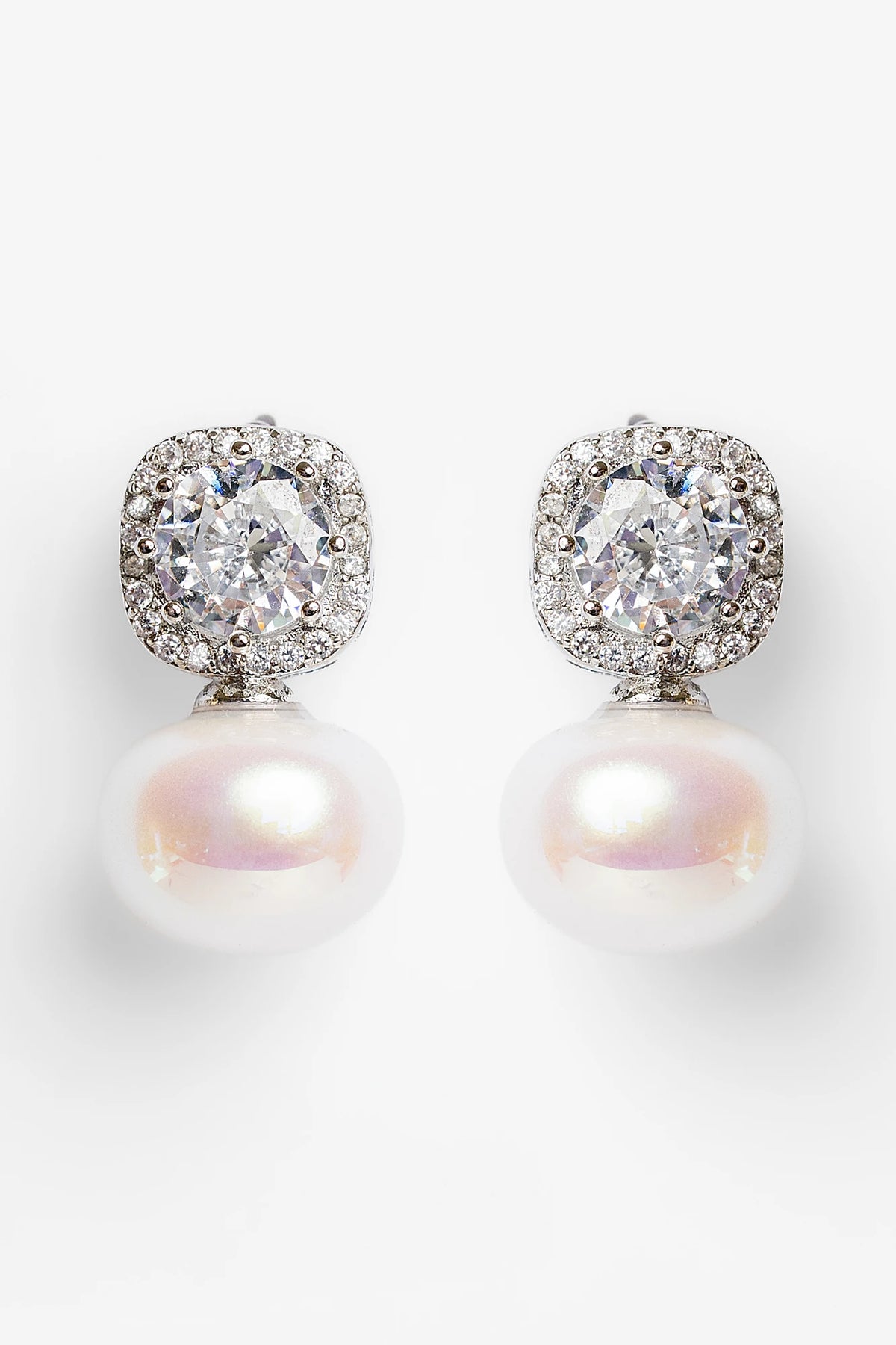Laurent Pearl Halo Stud Earrings in Silver with cubic zirconia halo and faux pearl drop.
