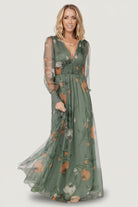 Close-up of Layla Tulle Maxi Dress dusty olive floral, highlighting copper-toned blooms, tulle overlay texture and smocked waist detail on model.
