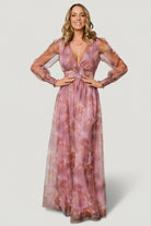Model seated in Layla Tulle Maxi Dress Dusty Orchid Floral, showing natural movement of the skirt and comfortable, bump-friendly fit.