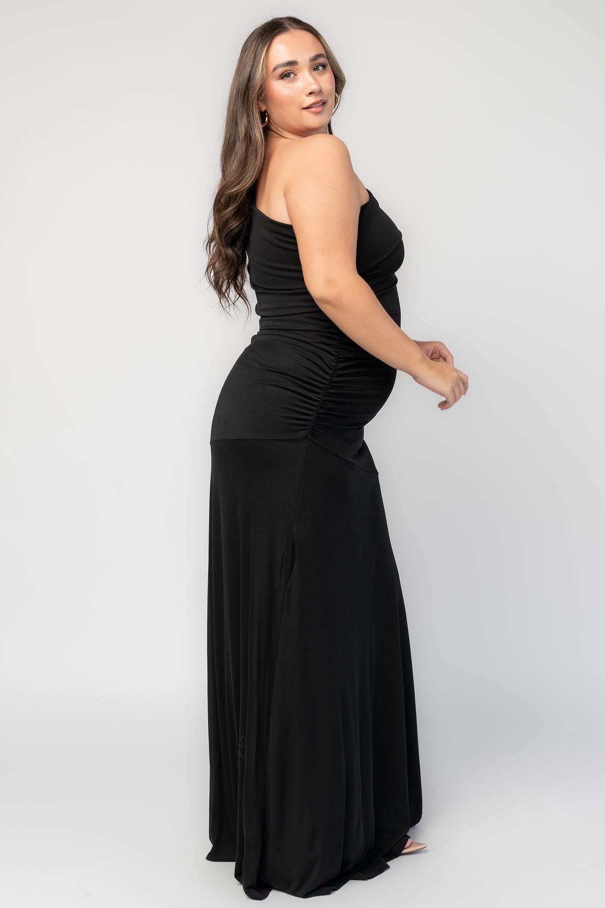 Leon One Shoulder Gown with asymmetrical neckline, diagonal draping, side ruching, and fitted maxi silhouette.
