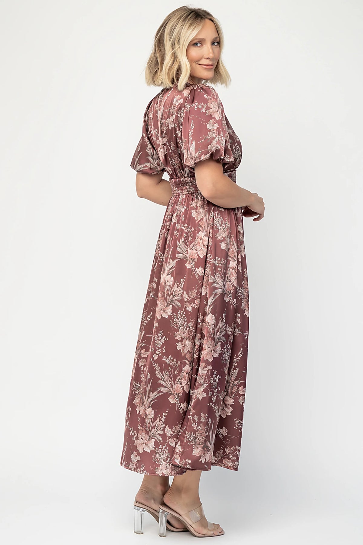 Lilibet Satin Dress in Clove Floral with V-neckline, short sleeves, faux front buttons, gathered waist, and satin finish.