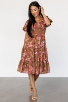 Styled detail of Lizzy midi dress fabric and embroidery, emphasizing the floral motif and lightweight chiffon overlay.
