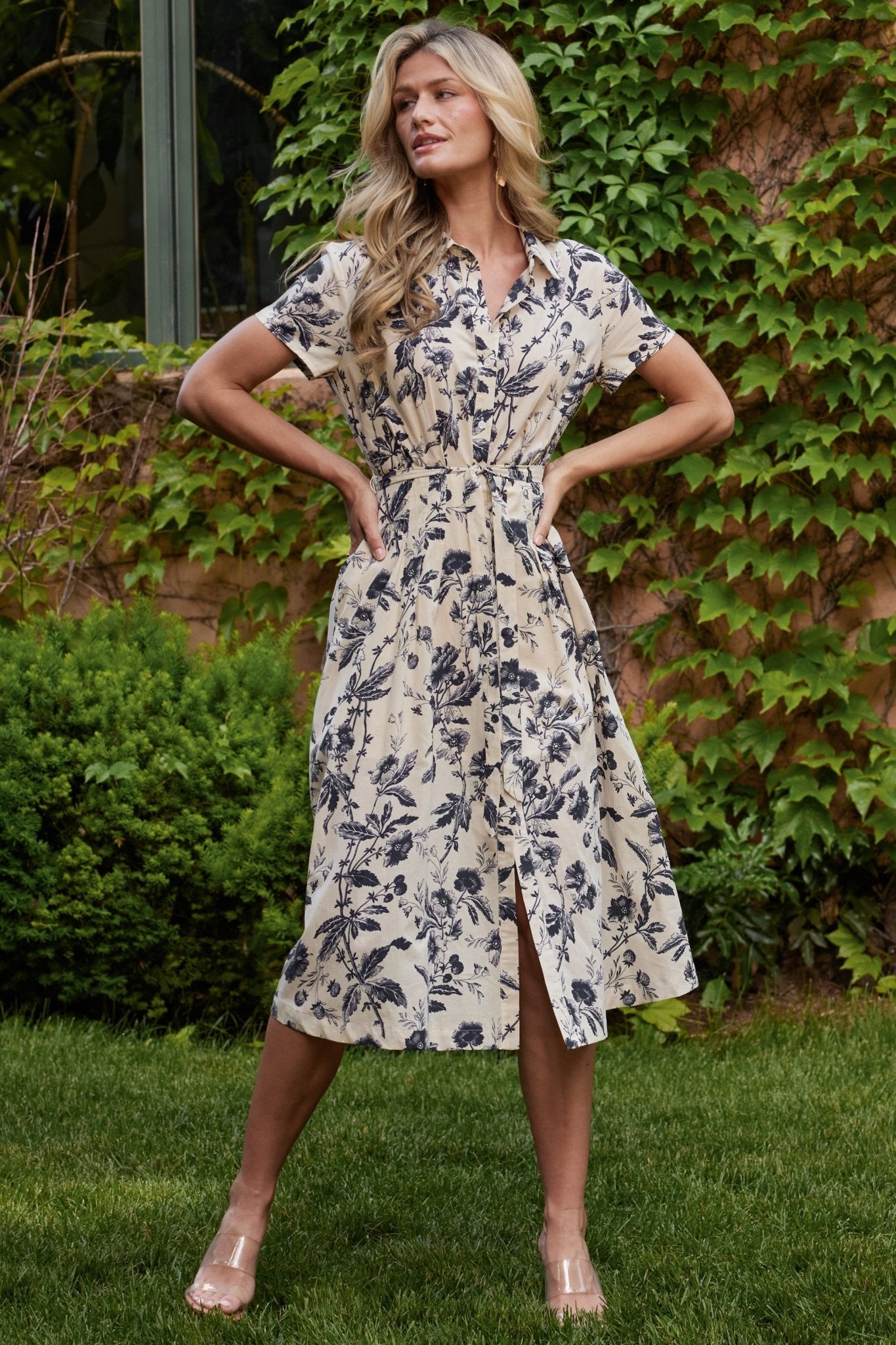 Close-up of button-front detail and fabric texture: lightweight 100% cotton with a slightly sheer finish visible.