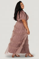 Studio close-up of Magdalena Tulle Maxi Dress skirt in dusty mink highlighting layered tiers, ruffle edges, and flowing silhouette.
