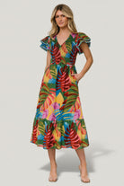 Front view of Marielle smocked midi dress in multicolor tropical leaf print showing smocked bodice and midi hem.