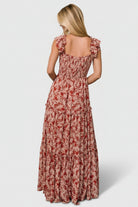 Close-up of Martina Maxi Dress bodice showing gathered bust, delicate ruffle at elastic shoulder, and double-layered flutter sleeve.