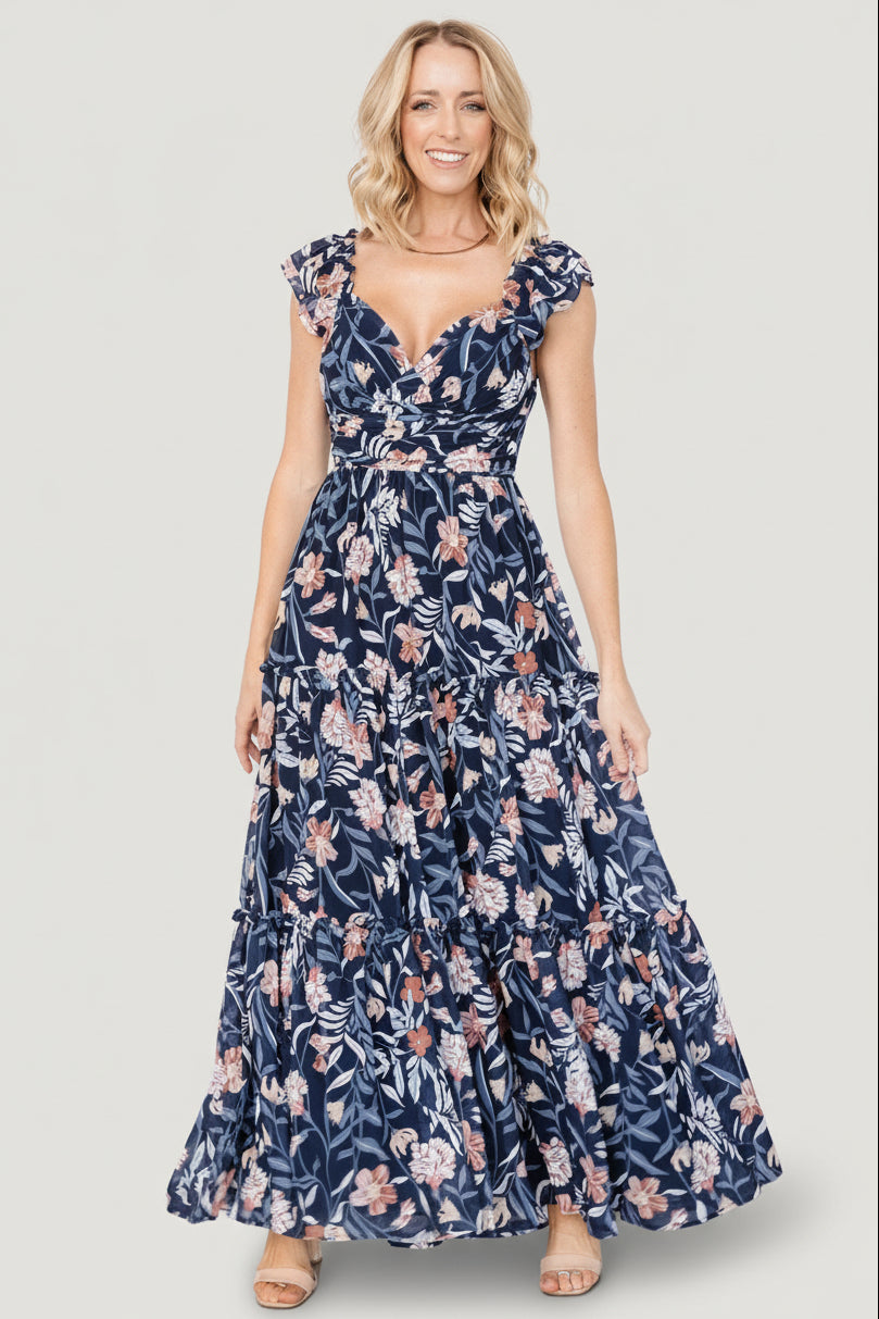Back view of Martina Maxi Dress in navy multi, showing smocked back bodice, flow of the skirt, and overall silhouette.