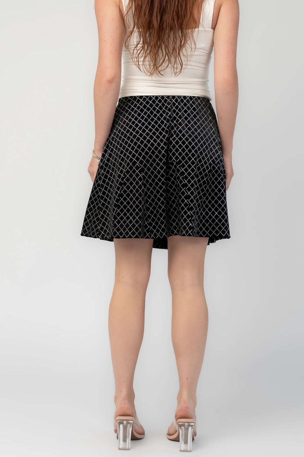 Michelle Flare Skirt in Black with rhinestone embellishments, elastic waistband, and flared silhouette.