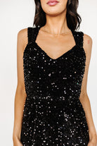 Back view of Monroe sequin gown highlighting the V-back, fully lined construction and smooth seam lines for an elegant finish.