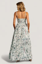 Fabric and print detail of Naia Maxi Dress showing tropical sage motifs with pink and lavender accents on medium-weight woven polyester.