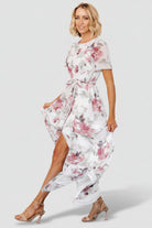 Styled view of Naomi dress with removable self-tie belt at the natural waist, illustrating waist definition and maxi length.