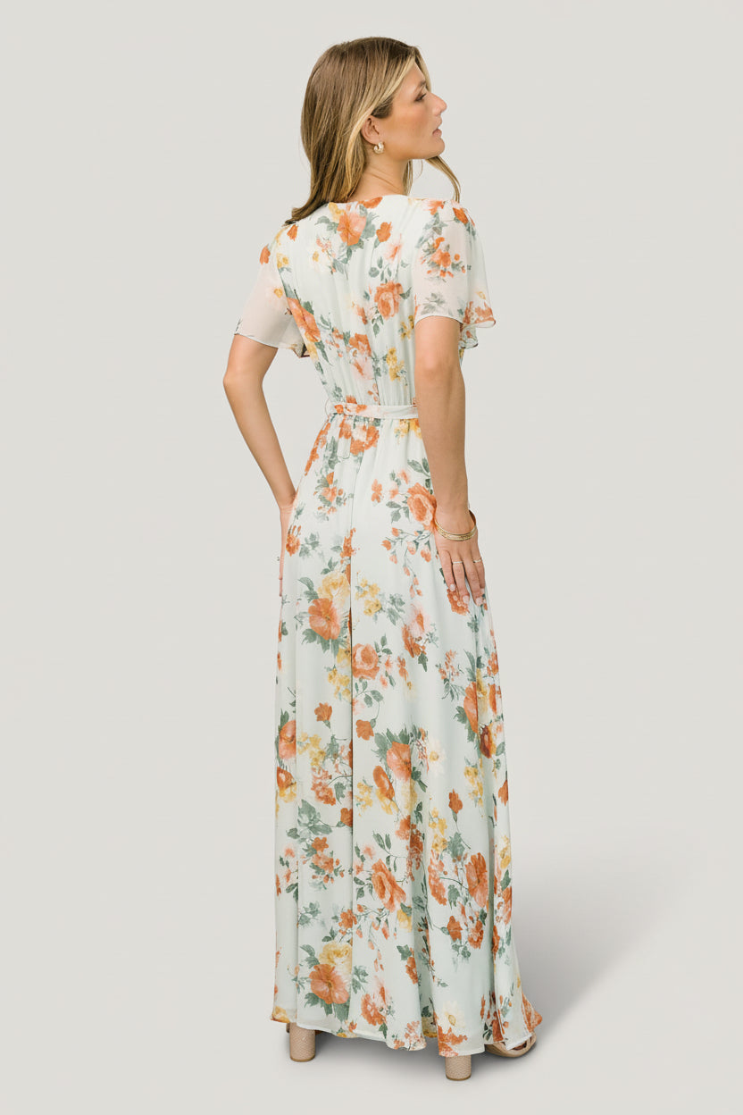 Back view showing keyhole with single-button closure, elastic back waist and the removable belt tied at the natural waist for shape.