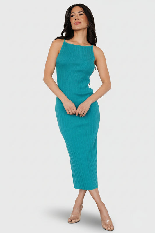 Front view of teal Natia tank dress showing textured rib-knit fabric, high neckline, small tank sleeves, and midi straight hem on white background.