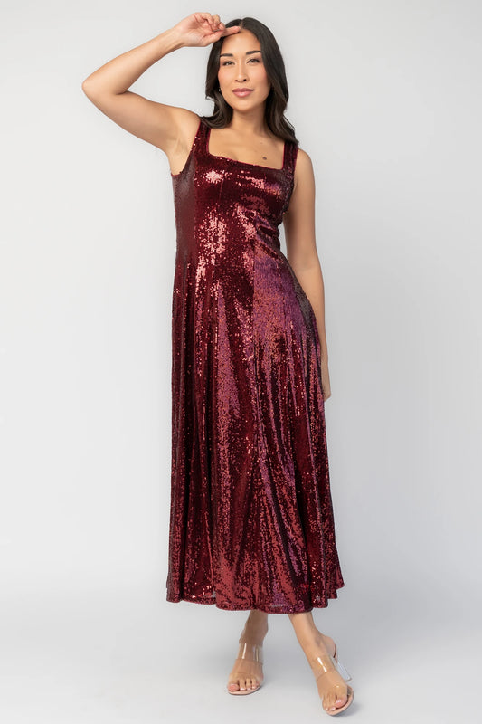Nell Sequin Dress in Wine with allover shimmering sequins, square neckline, tank sleeves, and structured silhouette.