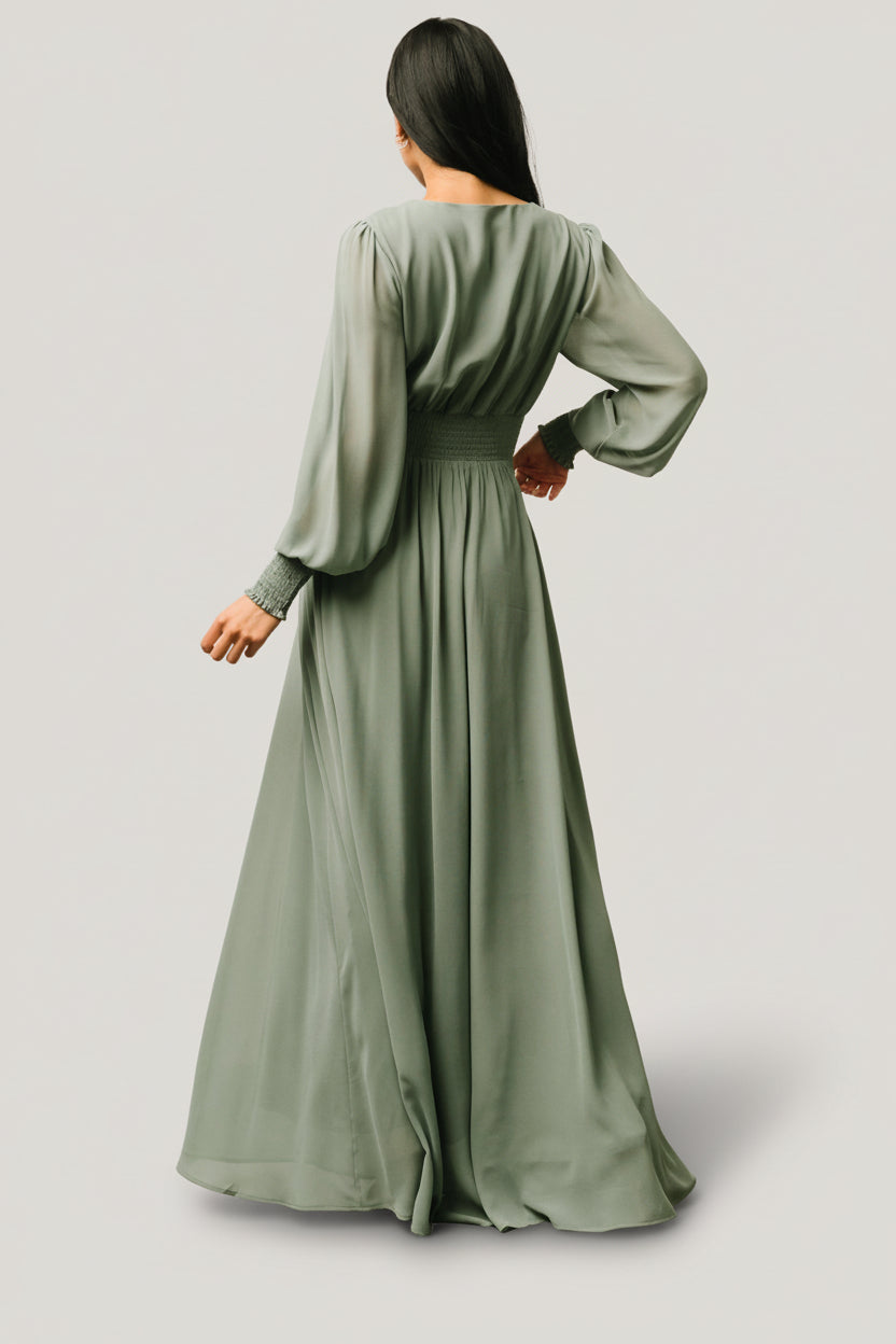 Detail image of long sleeve with smocked cuff on eucalyptus chiffon Olivia Maxi dress, showing sleeve volume and finish.