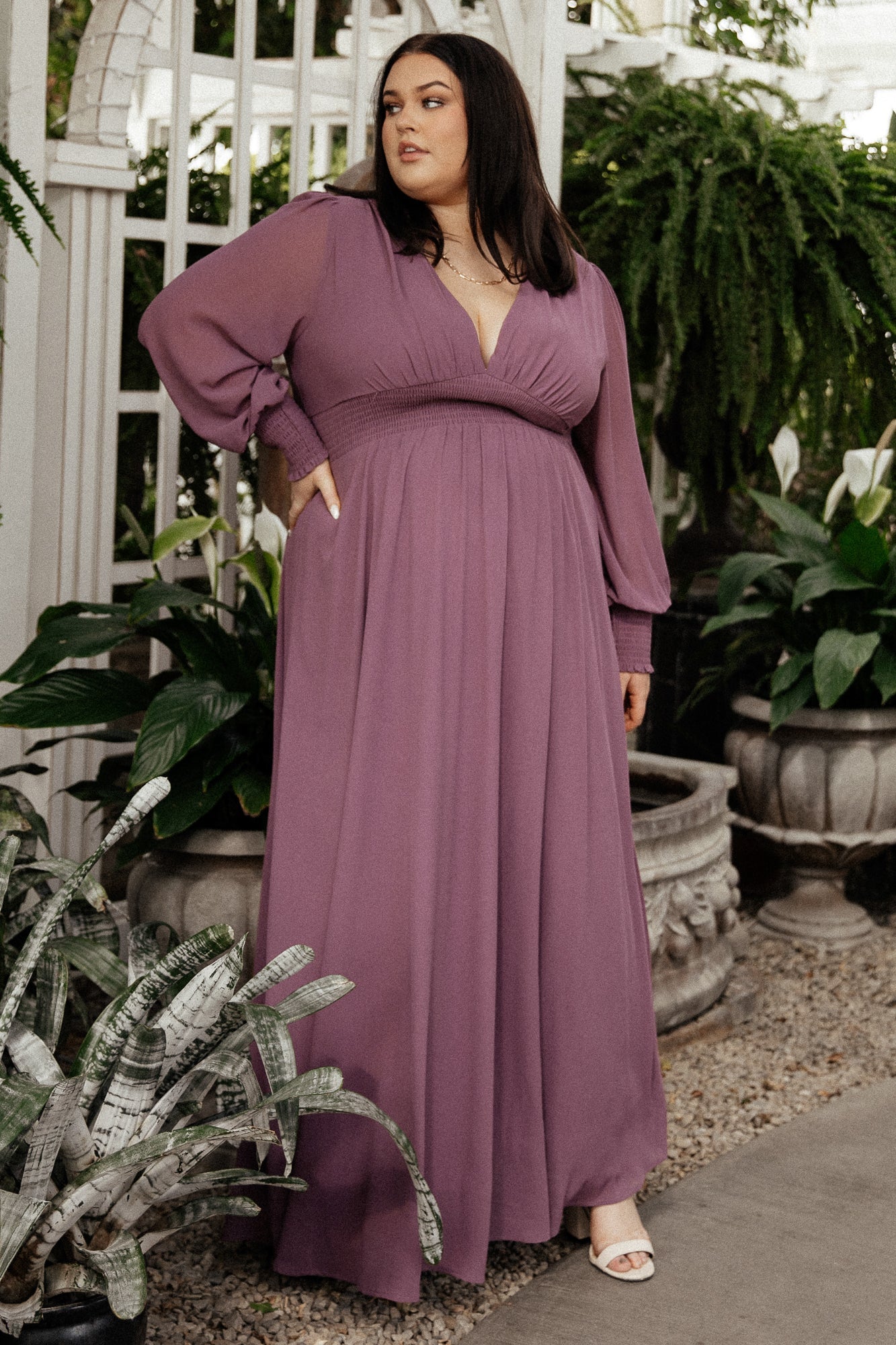 Styled look of Olivia Maxi Dress in vintage plum with accessories, demonstrating versatility for formal and casual occasions.