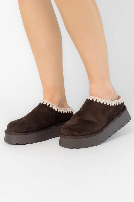 Pamela Platform Cozy Mule Slippers in Chocolate with faux suede, plush lining, whipstitch trim, and platform sole.