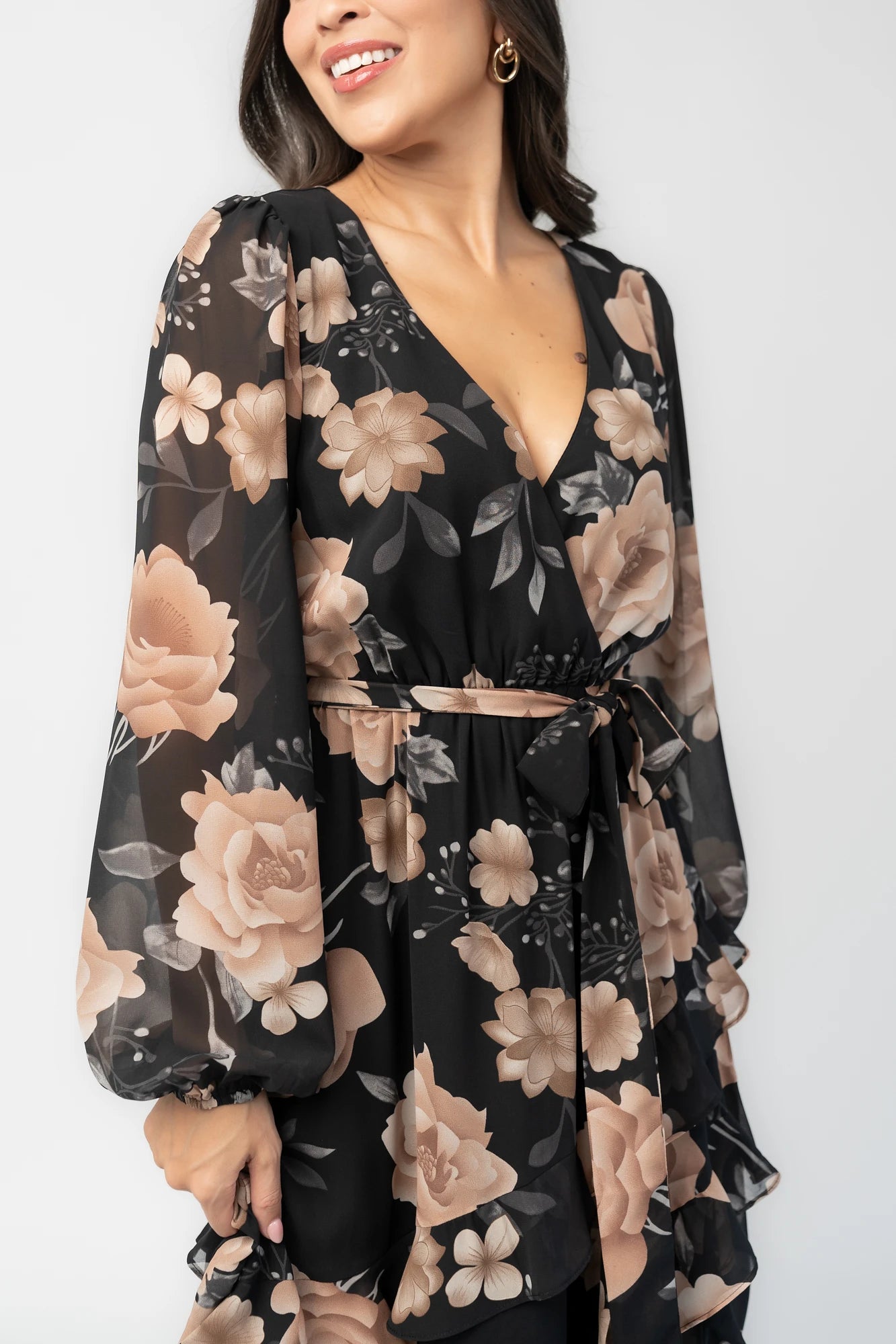 Phaedra Maxi Dress in Black + Taupe Floral with surplice V-neck, long sleeves, sash waist, and tiered skirt.
