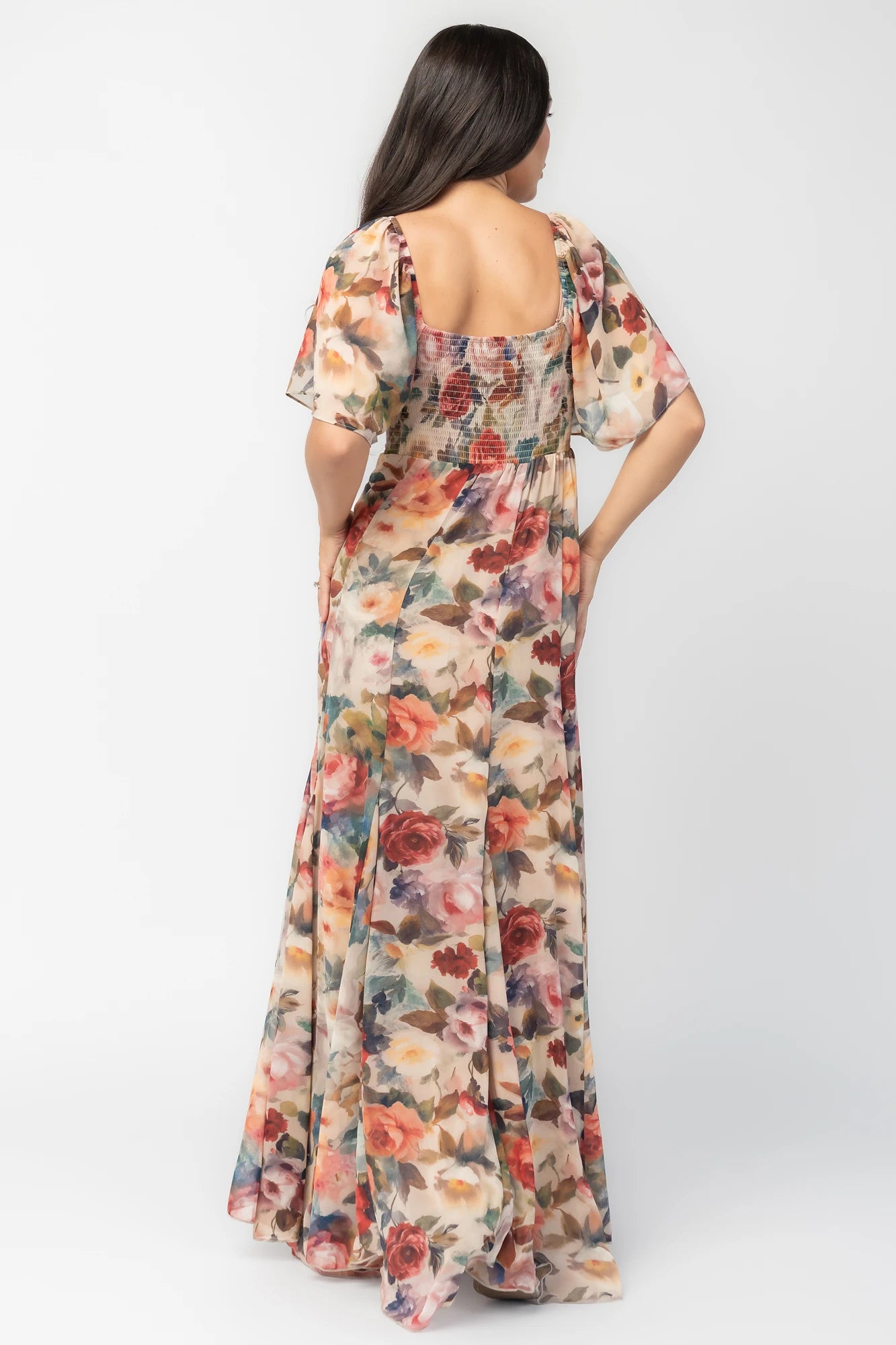 Positano Maxi Dress in Rose Multi Floral with sweetheart knot neckline and flutter sleeves.