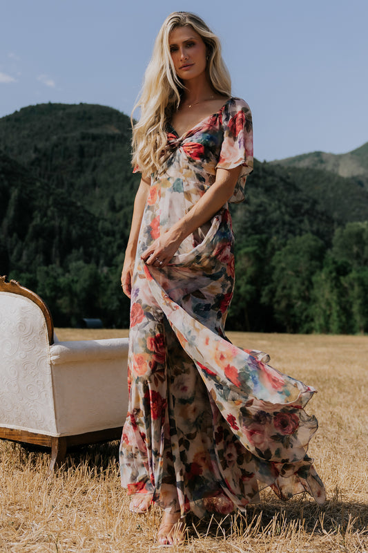 Positano Maxi Dress in Rose Multi Floral with sweetheart knot neckline and flutter sleeves.
