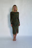 Green velvet floral midi dress with a boat neckline, long sleeves, side ruching, and a side slit.
