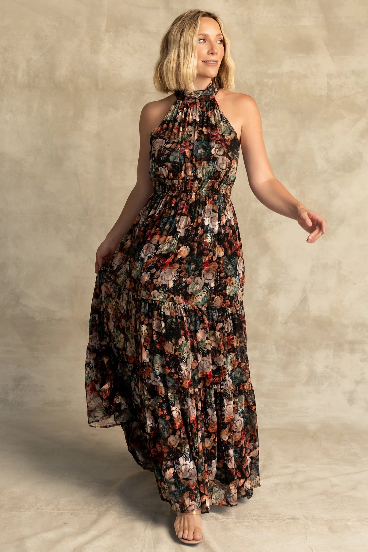 Pulitzer Maxi Dress in Black Multi Floral with halter neckline, smocked waist, tie-back detail, and tiered chiffon skirt.