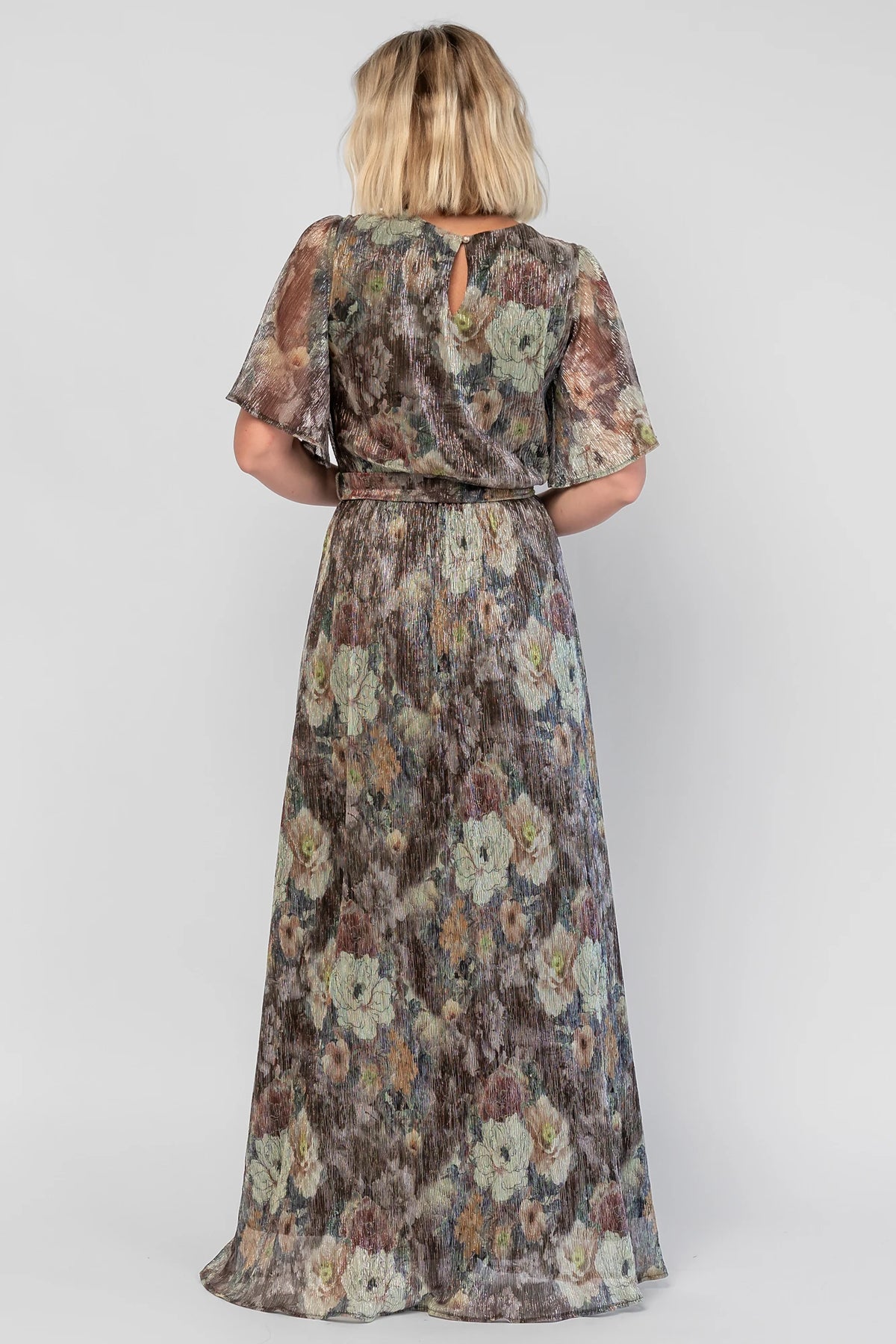 Rachel Maxi Dress in Green Multi with abstract floral details, a faux-wrap neckline, and semi-sheer overlay.