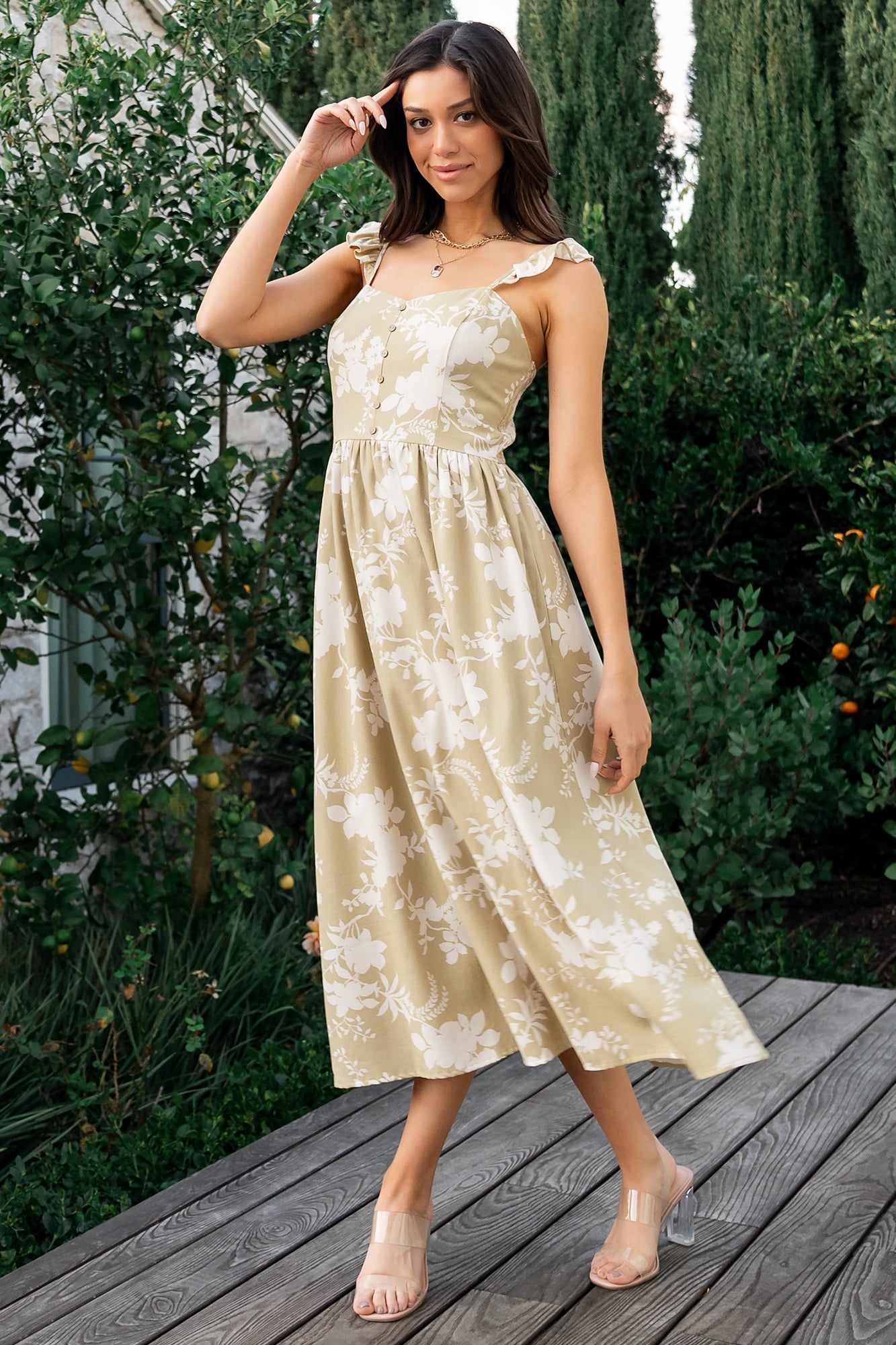 Front view of Renna Button Top Dress in vintage sage floral print, showing sweetheart neckline, faux buttons, and ruffled tank sleeves.