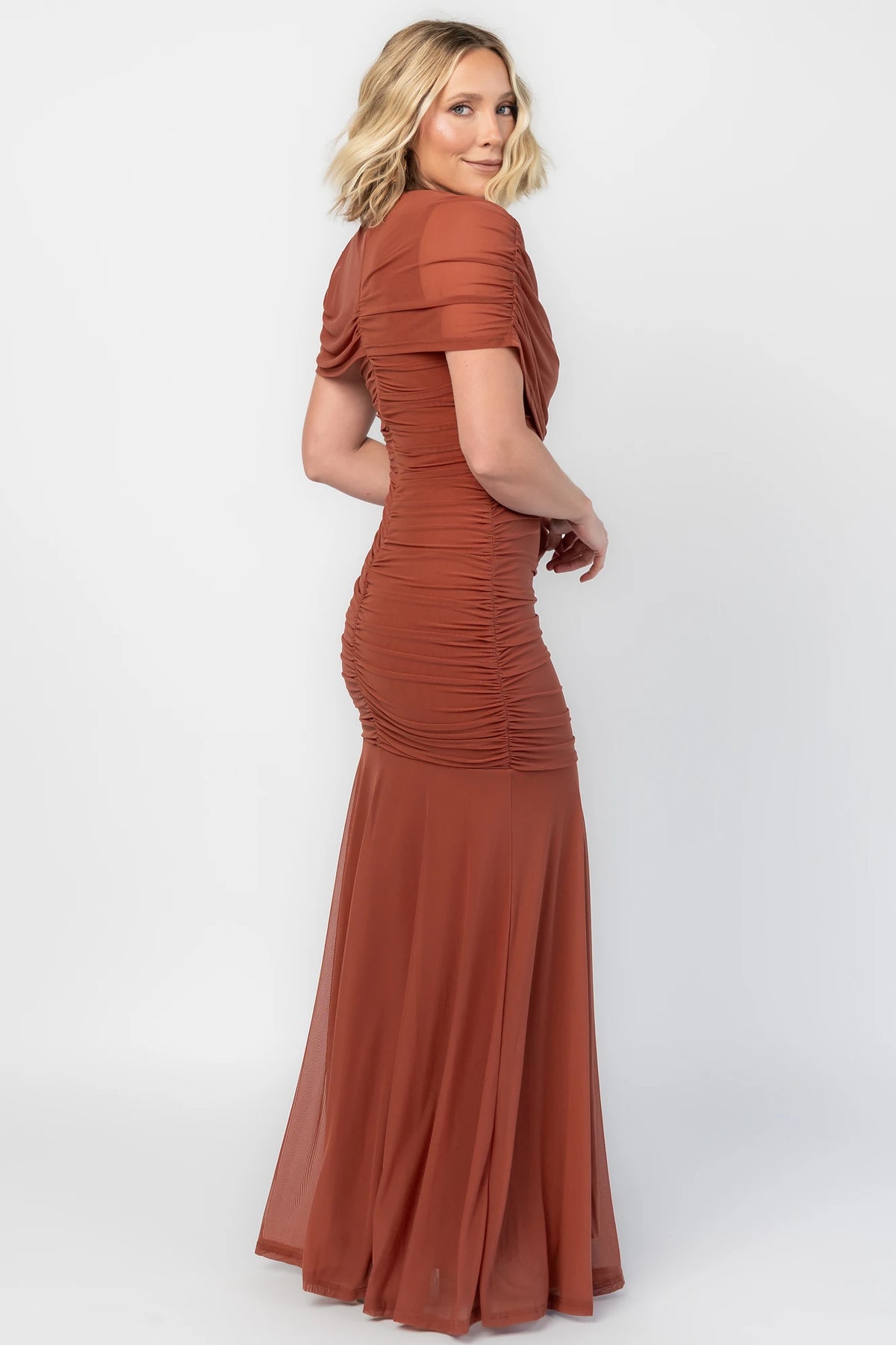 Serenade Maxi Dress in Cinnamon with an asymmetrical neckline, shoulder overlay, and a mermaid hem.
