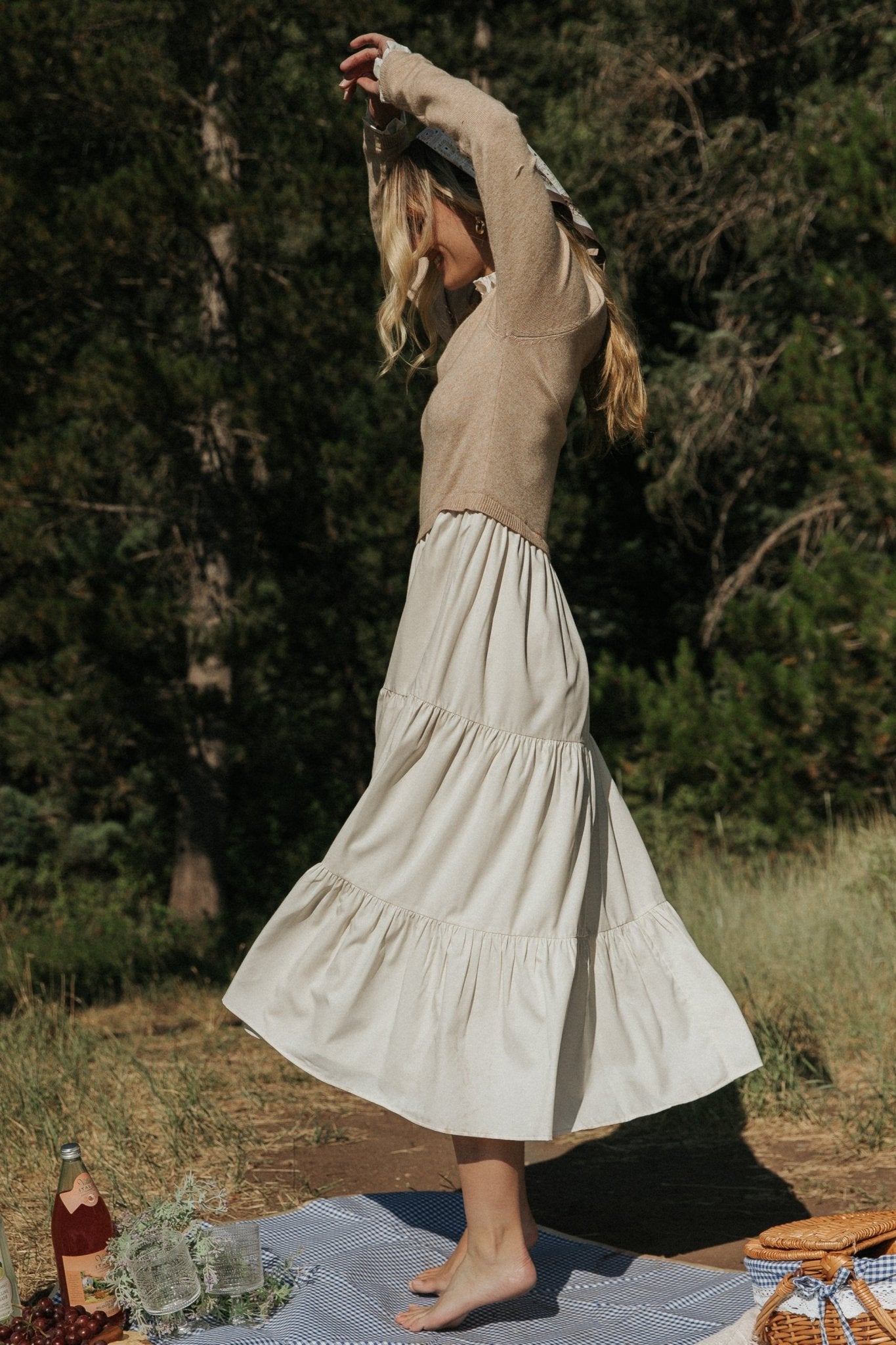 Close-up of Sophie Sweater Dress ruffled neckline and lightweight sweater-knit bodice in Natural colorway.