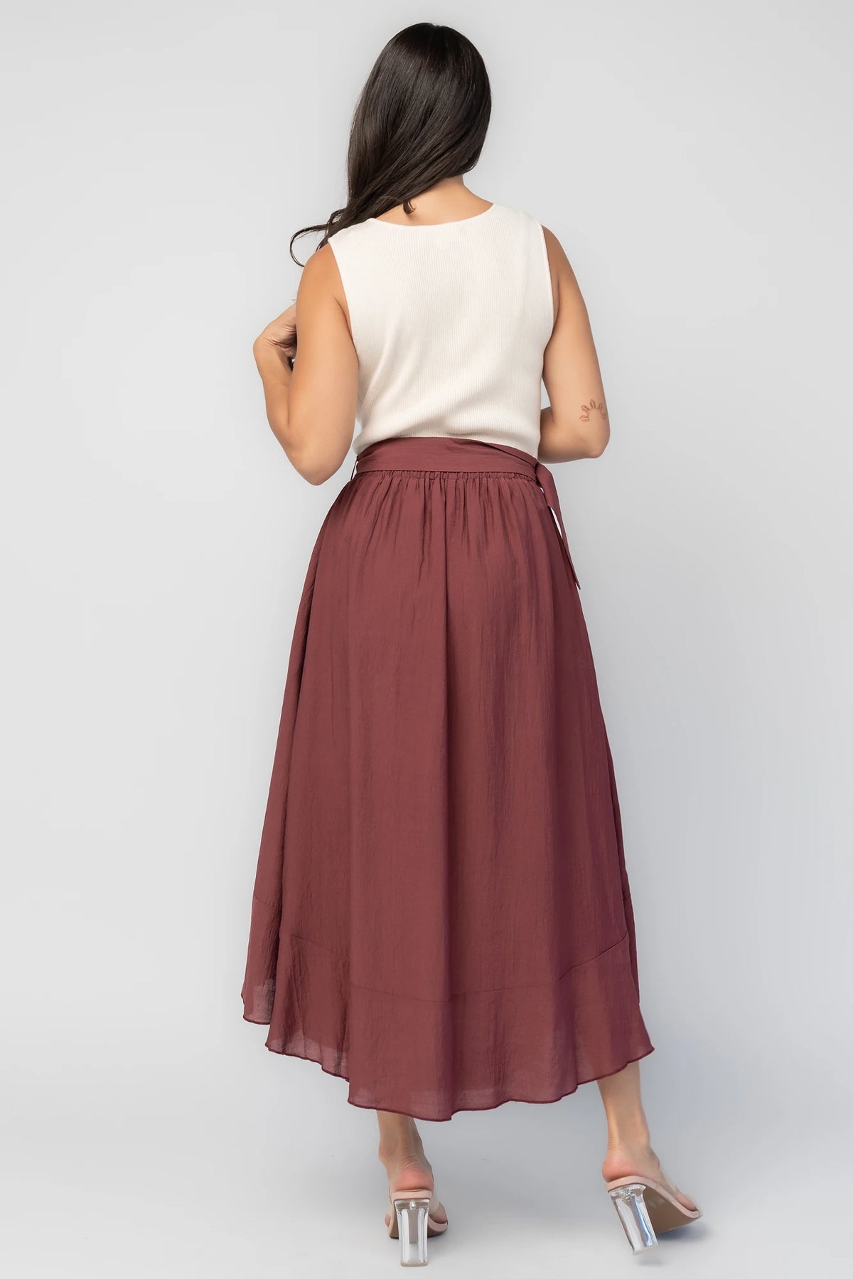 Stacy Midi Dress in Ivory + Mahogany with ribbed knit bodice, scoop neckline, waist sash, and flowing midi skirt.