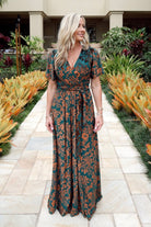 Close-up of the detachable self-tie sash on Uma Velvet Maxi Dress in bronze and jade, showing fabric texture and edge finish.